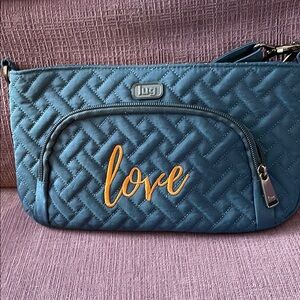 Lug Blue Quilted Crossbody Bag FLYER in brushed navy with copper LOVE stitching